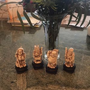 Set of four Asian ivory figures